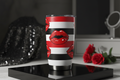 Bold lips and stripes tumbler in red white and black with glamorous retro aesthetic